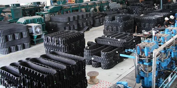 Rubber tracks and industrial rubber products in a manufacturing plant