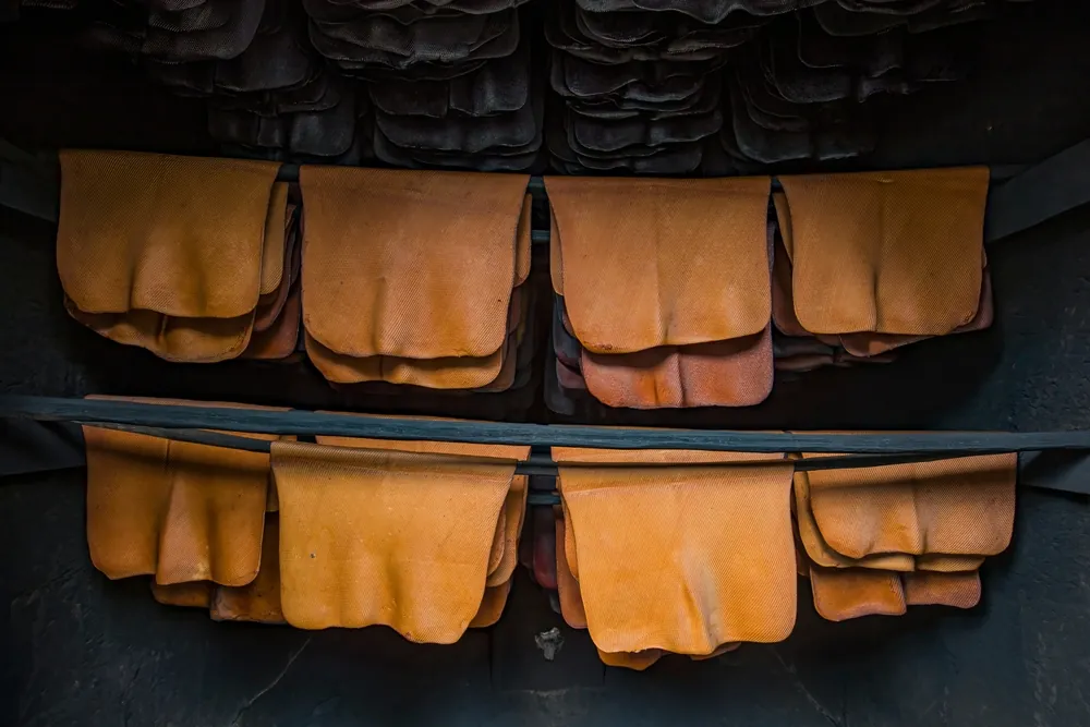 Rubber sheets curing in a smokehouse
